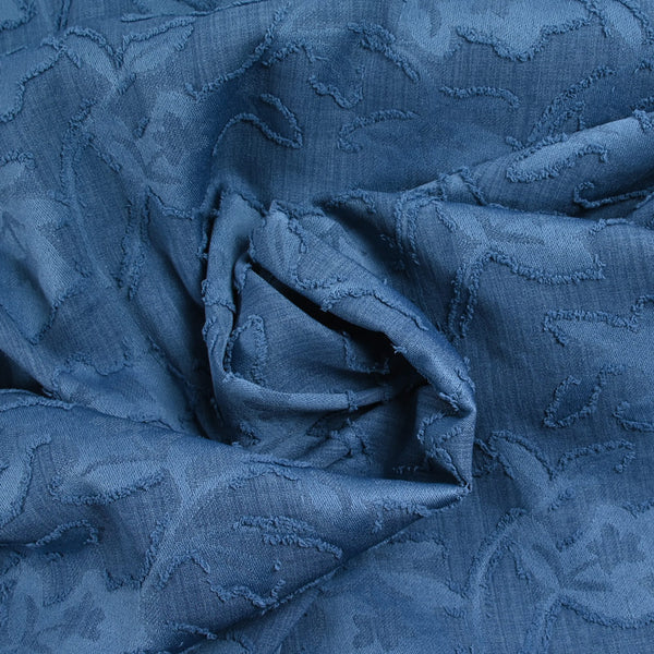 Jacquard de polyester fleurs plumetis bleu