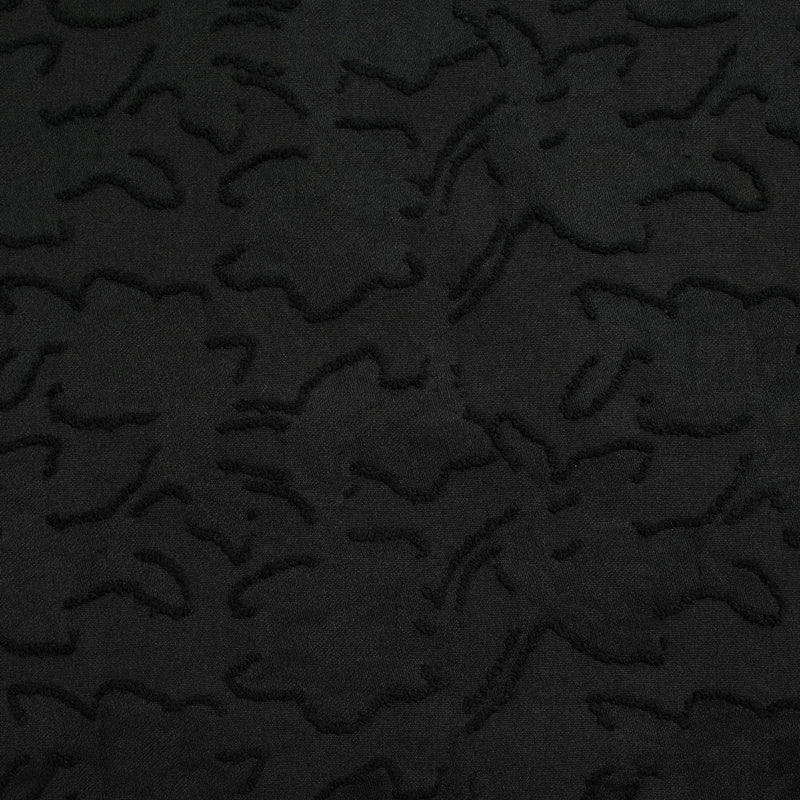 Jacquard de polyester fleurs plumetis noir