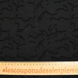 Jacquard de polyester fleurs plumetis noir