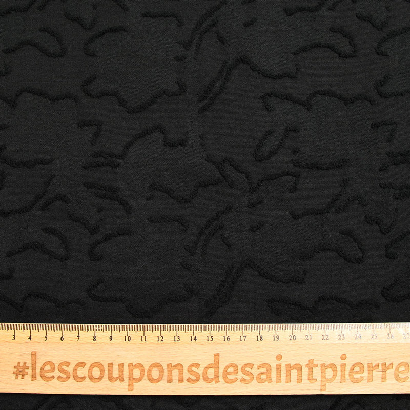 Jacquard de polyester fleurs plumetis noir