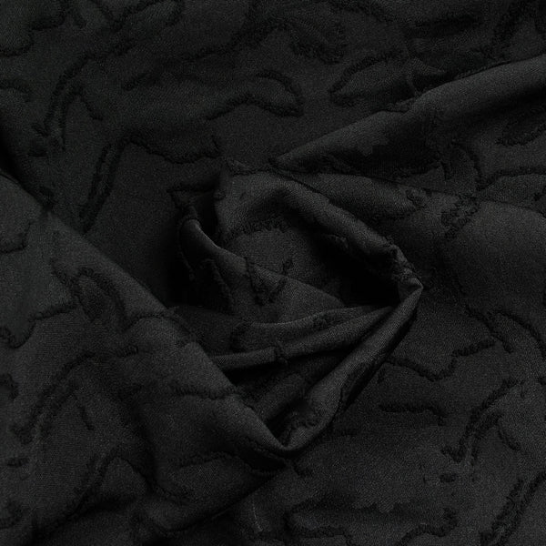 Jacquard de polyester fleurs plumetis noir