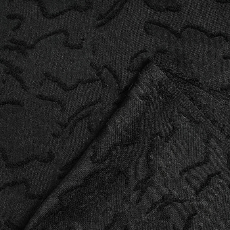 Jacquard de polyester fleurs plumetis noir