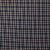 Tejido de polialgodón teñido con cuadros azul marino y burdeos oscuro sobre un fondo gris moteado.