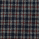 Tejido de polialgodón teñido con cuadros azul marino y burdeos oscuro sobre un fondo gris moteado.