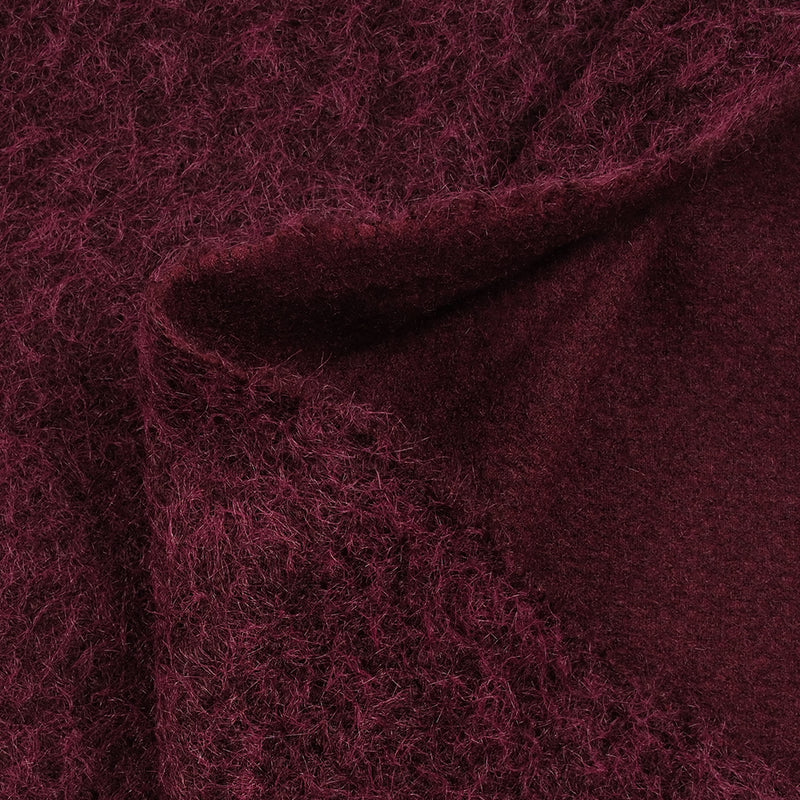 Lainage bouclette à poil long lie de vin