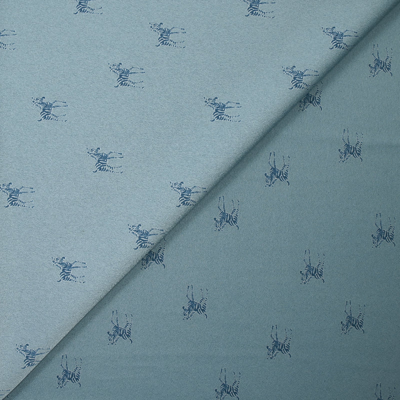 Crêpe satin de polyester imprimé zèbre fond bleu charrette