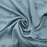 Crêpe satin de polyester imprimé zèbre fond bleu charrette