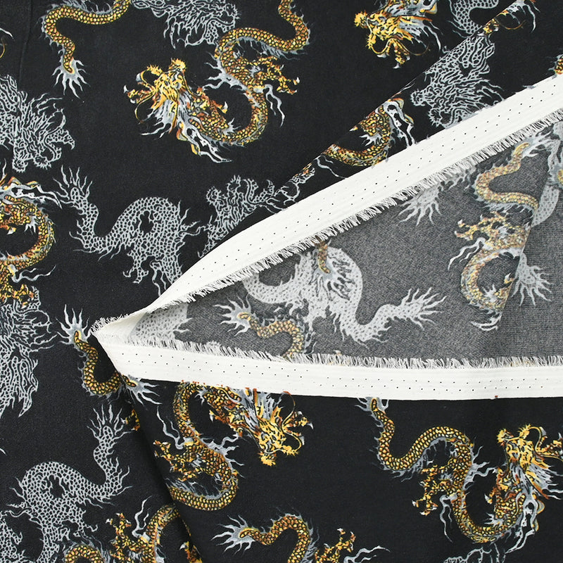 Satin de polyester mat imprimé serpent jaune et gris fond noir