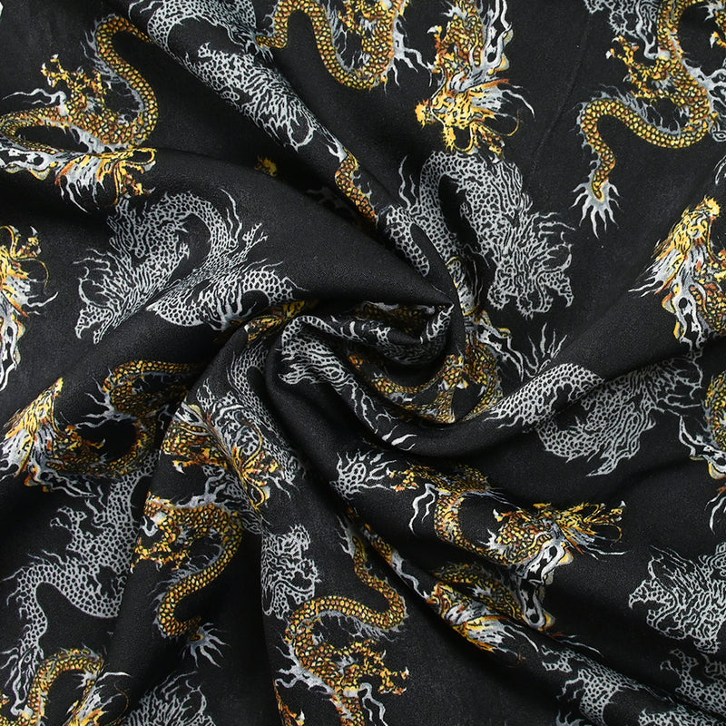 Satin de polyester mat imprimé serpent jaune et gris fond noir