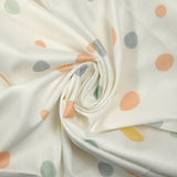 Coton imprimé à pois dessinés pastel fond blanc
