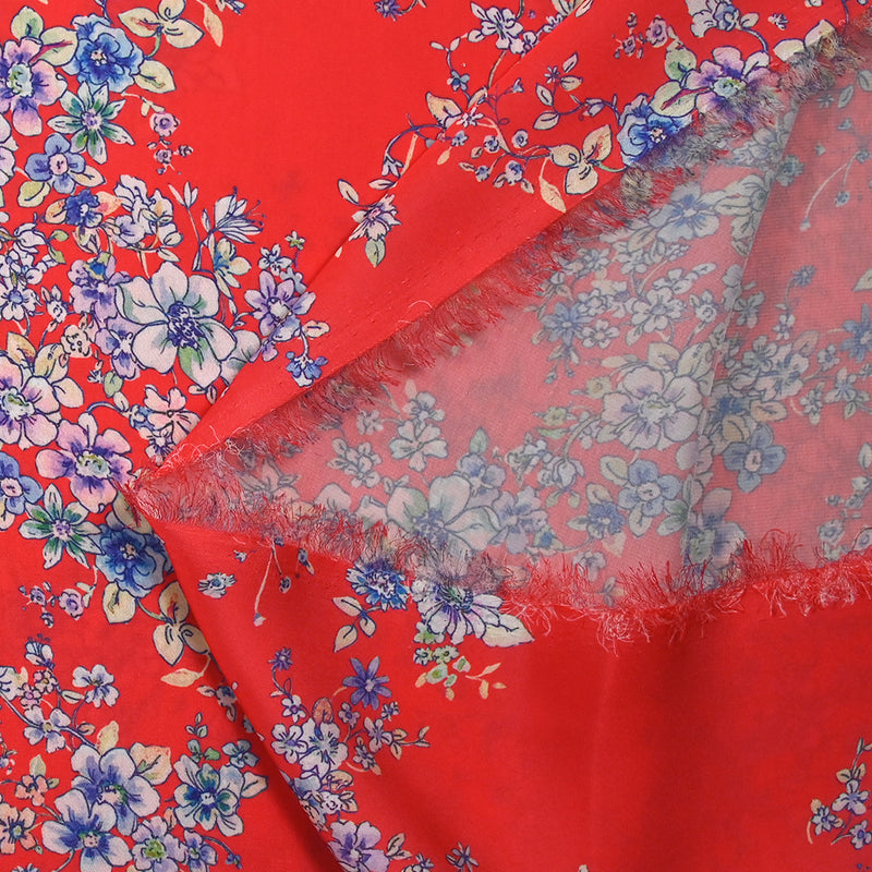 Satin polyester imprimé fleurs pastel fond rouge