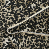 Crêpe satin de polyester imprimé léopard taupe et grège