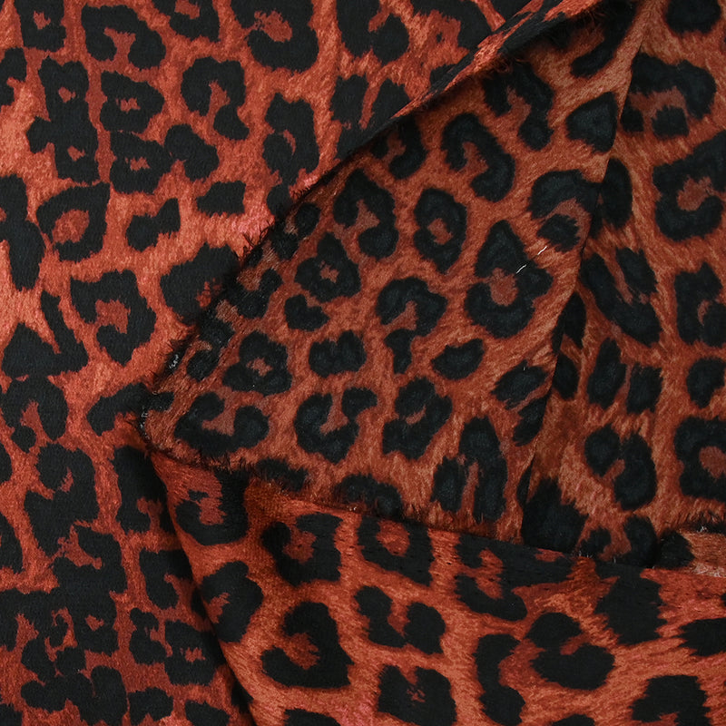 Crêpe satin de polyester imprimé graou fond rouille