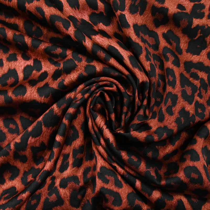 Crêpe satin de polyester imprimé graou fond rouille