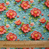 Coton imprimé fleurs en broderie fond bleu