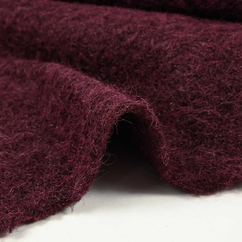 Lainage bouclette à poil long lie de vin