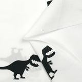 Coton imprimé dinosaure noir fond blanc