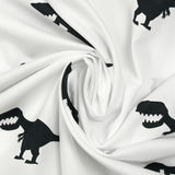 Coton imprimé dinosaure noir fond blanc