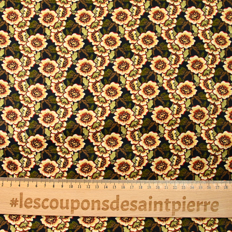 Polyester imprimé Capucine beige fond noir