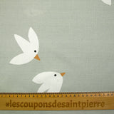 Popeline de coton imprimée vol d'oiseau fond vert-de-gris