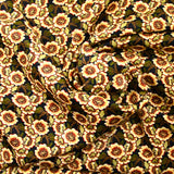 Polyester imprimé Capucine beige fond noir