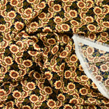 Polyester imprimé Capucine beige fond noir