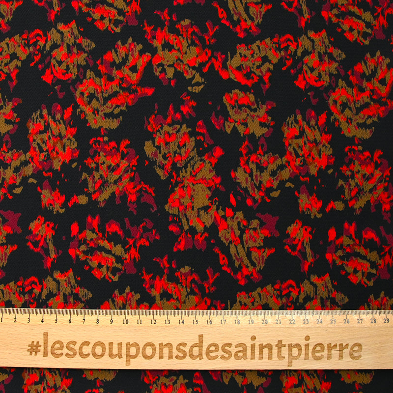 Crêpe polyester imprimé feu fond noir