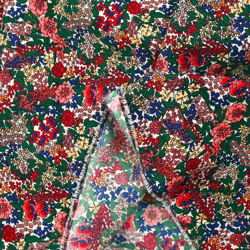 Polyester imprimé tempête de fleurs rouge fond blanc