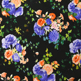 Maille de viscose satinée imprimée fleurs de nuit pêche et bleu fond noir