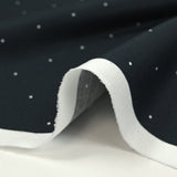 Coton imprimé à mini pois fond bleu nuit