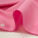 Coton imprimé pois 1mm fond rose barbie