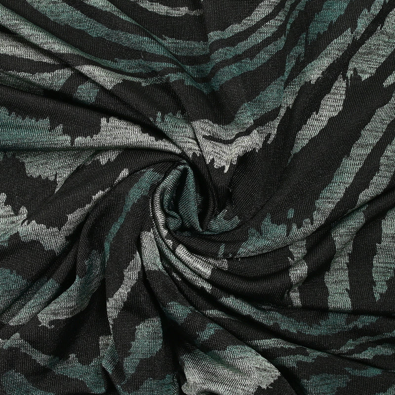 Maille polyester imprimée thème animal pétrole fond chiné