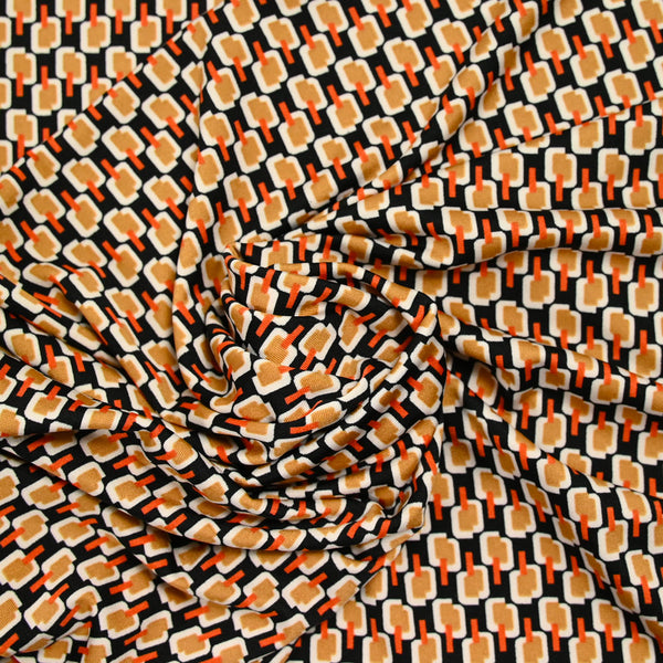 Maille polyester imprimée camel fond noir