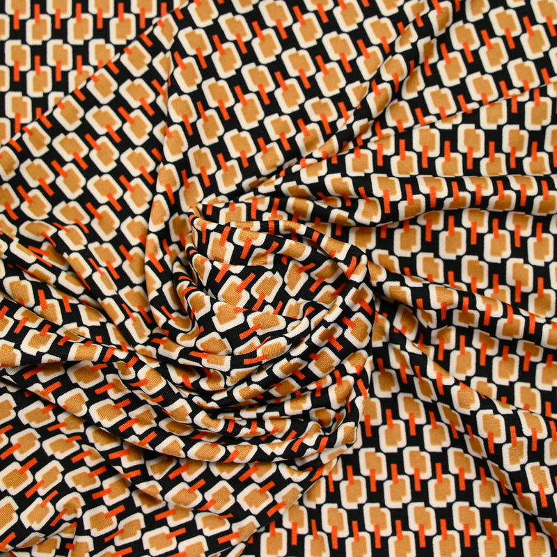 Maille polyester imprimée camel fond noir