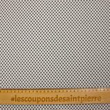 Jersey de coton imprimé losanges pointillés fond blanc cassé