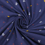Jersey de coton imprimé café et baguette fond indigo