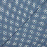Punto de algodón estampado círculos y medias lunas carro fondo azul