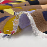 Crépon de viscose imprimé palette florale fond marron