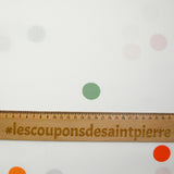 Coton imprimé à pois colorés fond blanc