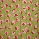 Double gaze matelassée double face Bangkok fond blanc et vert au mètre