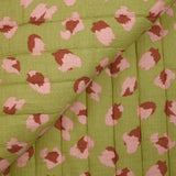 Double gaze matelassée double face Bangkok fond blanc et vert au mètre