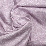 Coton imprimé mini fleurs fond parme