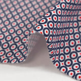 Jersey de coton imprimé pois rouge encerclé marine fond blanc