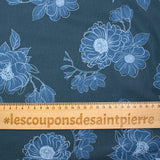 Coton imprimé fleurs fond marine
