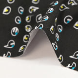 Cotton jersey pop bubbles print yellow and blue black background