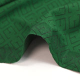 Jersey de coton imprimé monogramme fond vert forêt