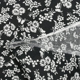 Popelina de algodón con estampado de pájaros cantores, fondo negro