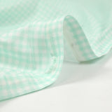 Coton imprimé à carreaux vert