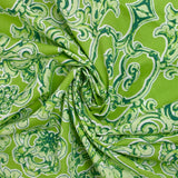 Voile de coton imprimé baroque fond vert anis