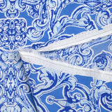 Voile de coton imprimé baroque fond bleu